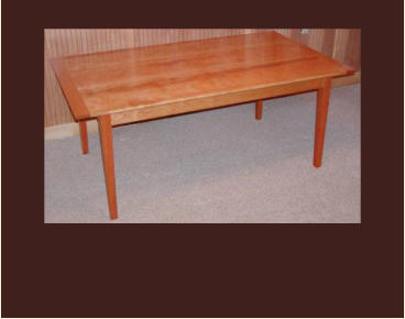 handmade shaker dining table in cherry with breadboard ends